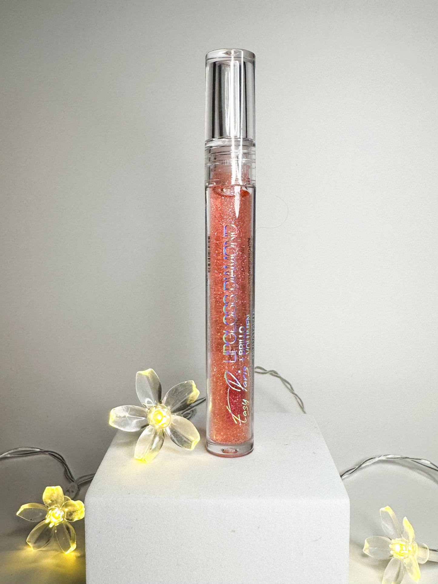 Gloss pailletée fruité à l’orange